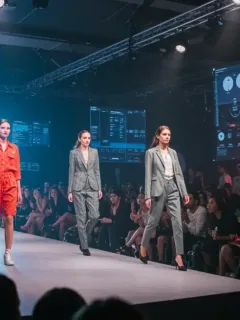 Futuristic fashion event with data overlays representing strategic budget allocation for ROI