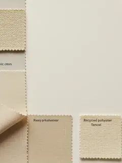 Collection of sustainable fabric swatches in spring colors for US fashion 2026