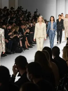 Vibrant fashion show in a modern venue, showcasing new trends and stylish attendees.