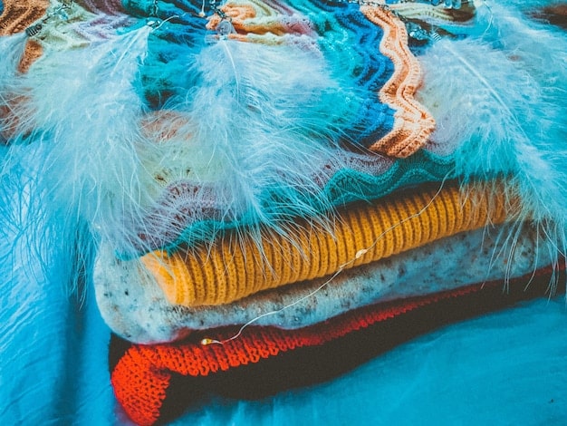 A close-up shot of different washes and styles of straight-leg jeans, with details like the stitching, pockets, and waistband visible. The jeans are arranged in a visually appealing manner.