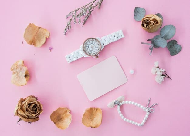 A flat lay showcasing budget-friendly accessories inspired by Ariana Grande, including a set of delicate gold necklaces, a pair of simple hoop earrings, various colorful scrunchies, and a selection of hair clips, all arranged on a pink background.