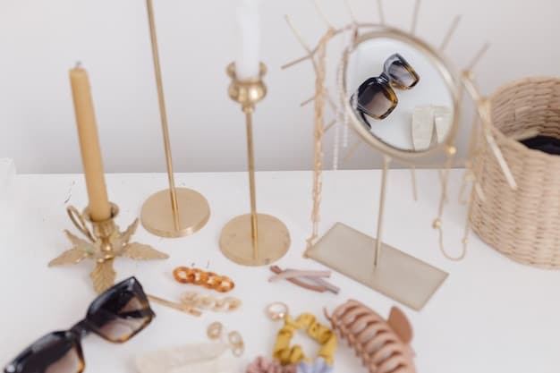 A close-up shot of various affordable accessories neatly arranged on a mirrored tray. Items include delicate gold necklaces, colorful beaded bracelets, simple stud earrings, and a patterned silk scarf. The background is soft and blurred.