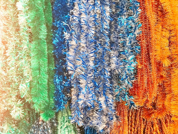 A close-up shot of various fabric swatches featuring different print types: floral, geometric (stripes and polka dots), animal print, and abstract patterns, showcasing the variety of options for mixing and matching.